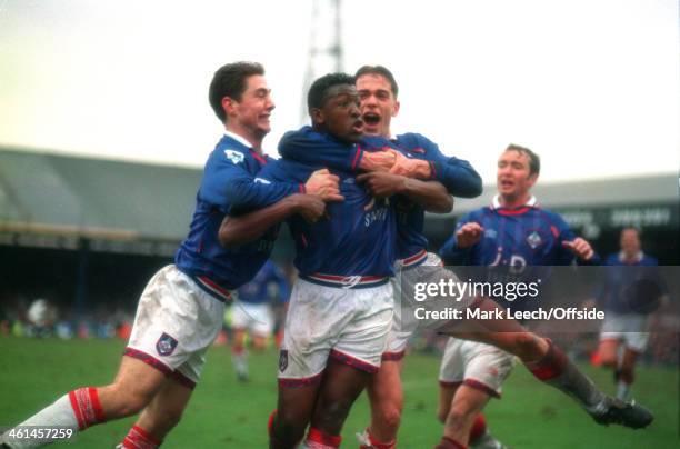 March 1994 - FA Cup Quarter Final - Bolton Wanderers v Oldham Athletic - Oldham players celebrate the winning goal with goalscorer Darren Beckford .