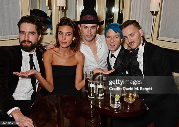 Jack Guiness, Alexa Chung and guests attend the launch of Tom Ford's new fragrance "Noir Extreme" at The Chiltern Firehouse on January 12, 2015 in...