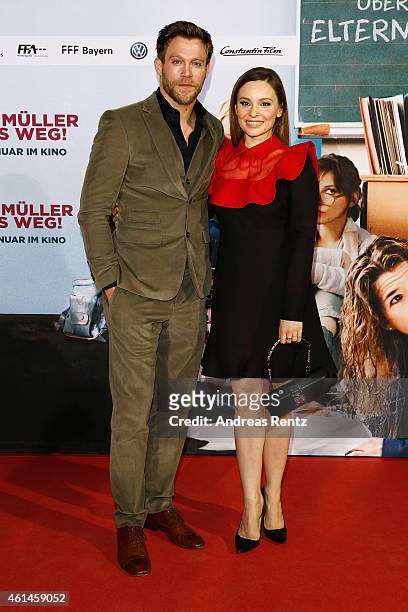 Ken Duken and Mina Tander attend the premiere of the film 'Frau Mueller muss weg' at Cinedom on January 12, 2015 in Cologne, Germany.