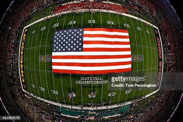 View of the American flag during the national anthem performed by Lady Antebellum prior to the College Football Playoff National Championship Game...
