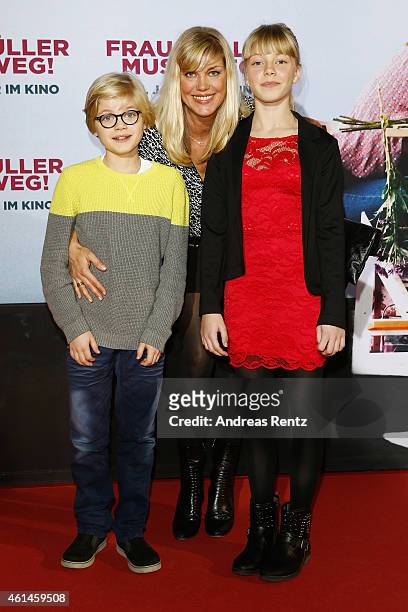 Cecilia Kunz and her kids Gretchen Wortmann and Hugo Wortmann attend the premiere of the film 'Frau Mueller muss weg' at Cinedom on January 12, 2015...