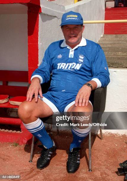 August 1994 English Football League Division Two - Leyton Orient v Birmingham City, Birmingham City manager Barry Fry sits by the dugout wearing full...