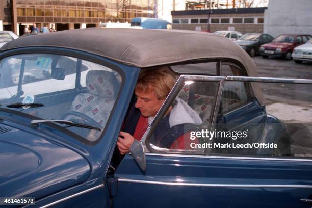 November 1994 Jurgen Klinsmann climbs into his VW Beetle in the car park of Tottenham Hotspur FC.