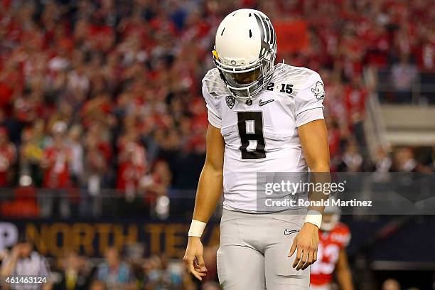 Quarterback Marcus Mariota of the Oregon Ducks reacts after being stopped at the one yard line on 4th down in the second quarter against the Ohio...