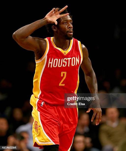 Patrick Beverley of the Houston Rockets celebrates his shot in the second half against the Brooklyn Nets at the Barclays Center on January 12, 2015...