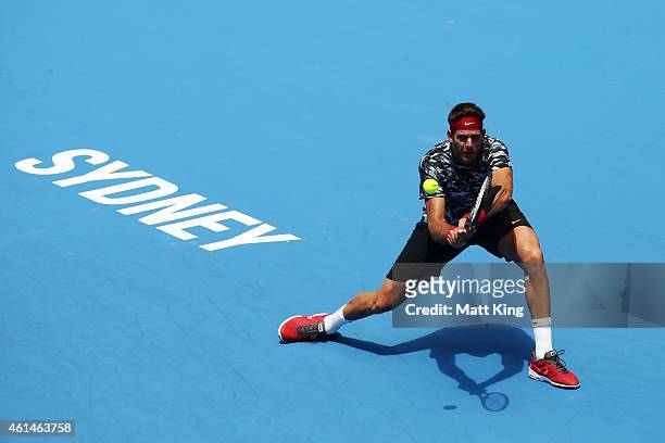 Juan Martin Del Potro of Argentina plays a backhand in his match against Sergiy Stakhovsky of Ukranie during day three of the Sydney International at...