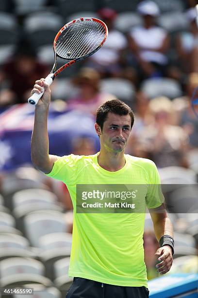 Bernard Tomic of Australia celebrates winning match point in his match against Igor Sijsling of the Netherlands during day three of the Sydney...