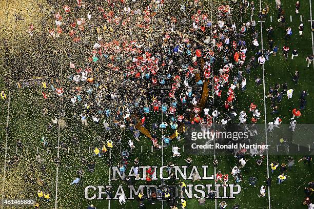 The Ohio State Buckeyes celebrate after defeating the Oregon Ducks 42 to 20 in the College Football Playoff National Championship Game at AT&T...