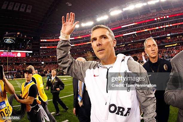 Head Coach Urban Meyer of the Ohio State Buckeyes celebrates after defeating the Oregon Ducks 42 to 20 in the College Football Playoff National...