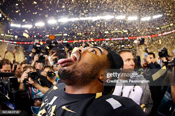 Running back Ezekiel Elliott of the Ohio State Buckeyes celebrates after defeating the Oregon Ducks 42 to 20 in the College Football Playoff National...