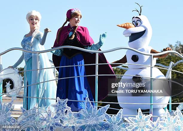 Disney characters of animation movie, Frozen, perform on a float during the new parade "Anna and Elsa's Frozen Fantasy" at Tokyo Disneyland in...