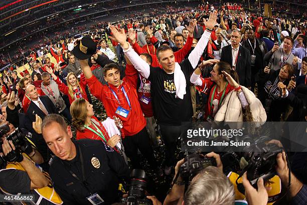 Head Coach Urban Meyer of the Ohio State Buckeyes celebrates after defeating the Oregon Ducks 42 to 20 in the College Football Playoff National...