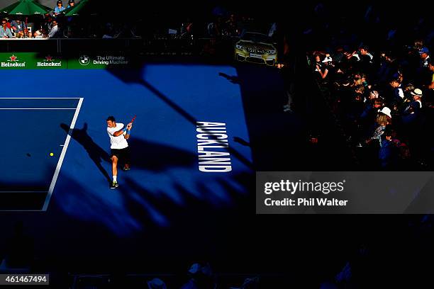 Michael Venus of New Zealand plays a backhand in his singles match against Alejandro Gonzalez of Colombia during day two of the 2015 Heineken Open...