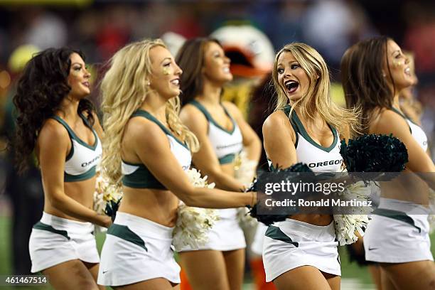 The Oregon Ducks cheerleaders perform against the Ohio State Buckeyes during the College Football Playoff National Championship Game at AT&T Stadium...