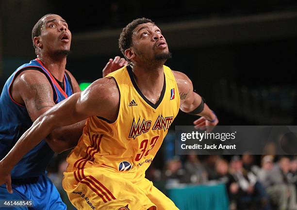 Tony Mitchell of the Fort Wayne Mad Ants looks to rebound the ball against the Tulsa 66ers during the 2014 NBA D-League Showcase presented by Samsung...