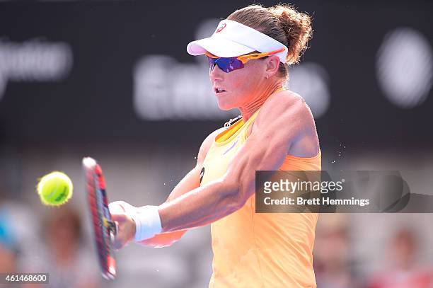 Samantha Stosur of Australia plays a backhand shot in her second round match against Barbora Zahlavova Strycova of Czech Republic during day three of...