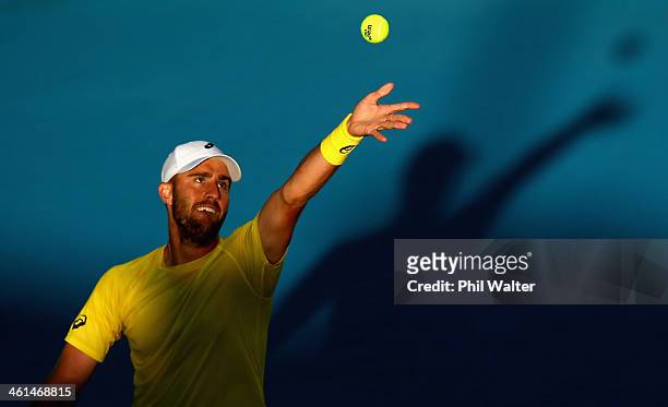 Steve Johnson of the USA serves against Yen-Hsun Lu of Chinese Taipei during day four of the Heineken Open at ASB Tennis Centre on January 9, 2014 in...