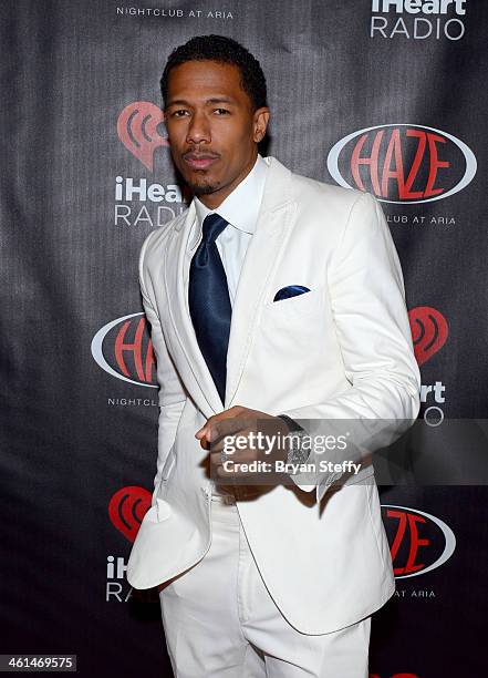 Actor Nick Cannon attends a private party celebrating CES 2014 hosted by iHeartRadio featuring a live performance by Krewella at Haze Nightclub at...
