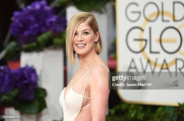 Actress Rosamund Pike attends the 72nd Annual Golden Globe Awards at The Beverly Hilton Hotel on January 11, 2015 in Beverly Hills, California.