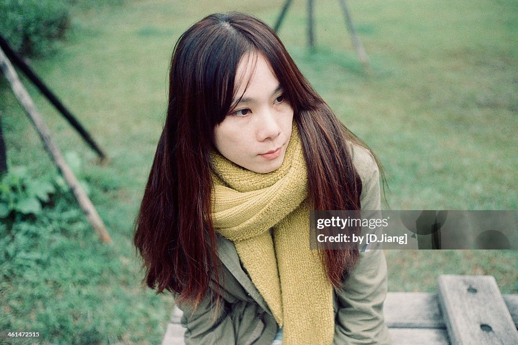 Girl with her yellow scarf