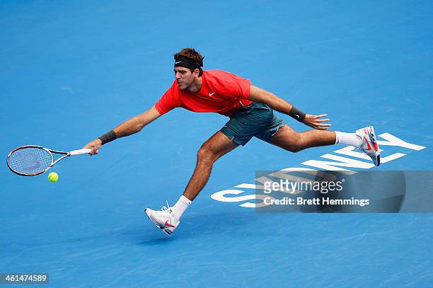 Juan Martin Del Porto of Argentina stretches for a forehand shot in his quarter final match against Radek Stepanek of the Czech Republic during day...