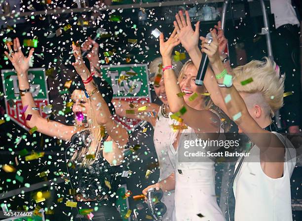 Maria Sharapova helps as Miriam Nervo and Olivia Nervo of NERVO DJ as they attend the TAG Heuer Party at Ms Collins on January 13, 2015 in Melbourne,...