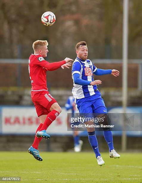 Maximilian Jansen of Hallescher FC and Julian Schieber of Hertha BSC go up for a header during a Friendly Match between Hertha BSC and Hallescher FC...
