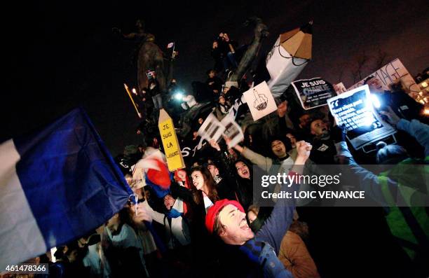 People take part in a Unity rally Marche Republicaine on January 11, 2015 at the Place de la Nation in Paris in tribute to the 17 victims of a...