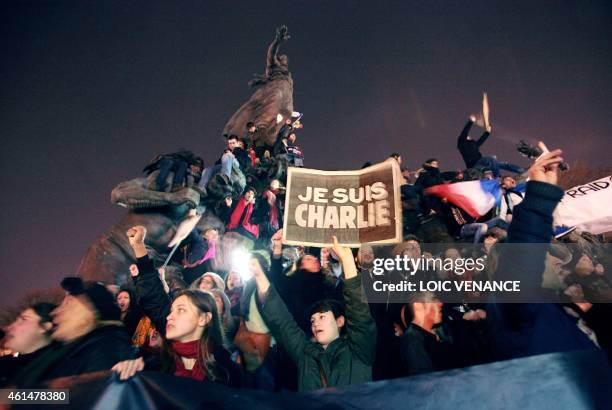 People take part in a Unity rally "Marche Republicaine" on January 11, 2015 at the Place de la Nation in Paris in tribute to the 17 victims of a...