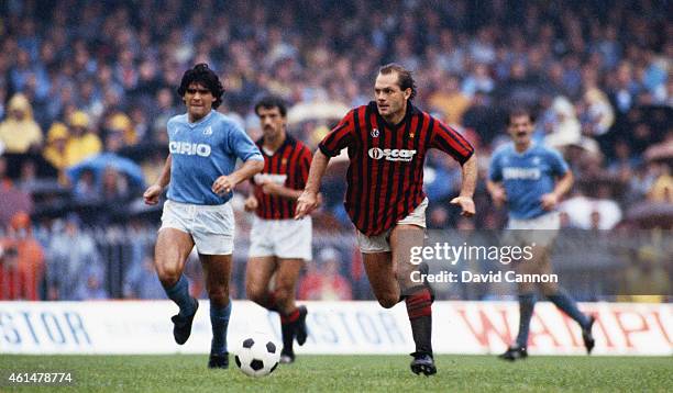 Milan player Ray Wilkins pulls away from Diego Maradona of Napoli during an Italian League match in 1984 in Naples, Italy.