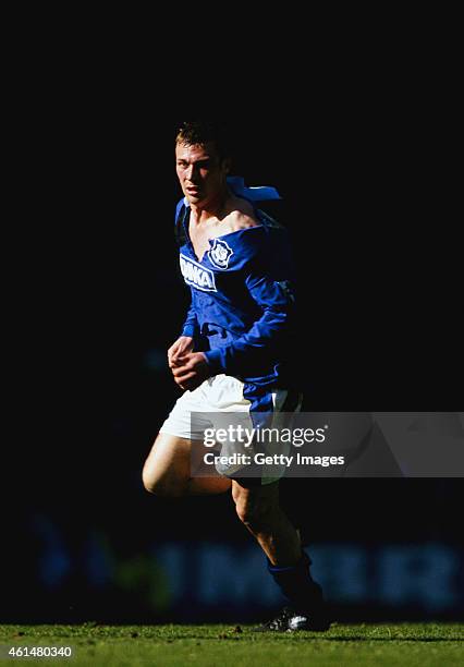 Everton striker Duncan Ferguson with a torn shirt makes a run during an FA Carling Premier League match between Everton and Tottenham Hotspur at...