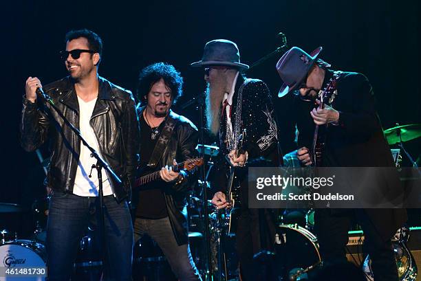 Singer Franky Perez, guitarist Steve Lukather of Toto, guitarist Billy Gibbons of ZZ Top and guitarist Jimmy Vivino perform on stage at The Roxy...