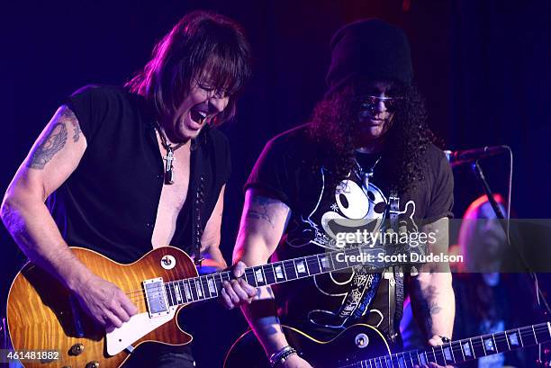 Guitarists Richie Sambora of Bon Jovi and Slash of Guns N' Roses perform on stage at The Roxy Theatre on January 12, 2015 in West Hollywood,...