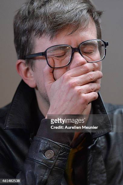 Charlie Hebdo cartoonist, Renald Luzier aka Luz, speaks during the Charlie Hebdo press conference held at the Liberation offices in Paris on January...