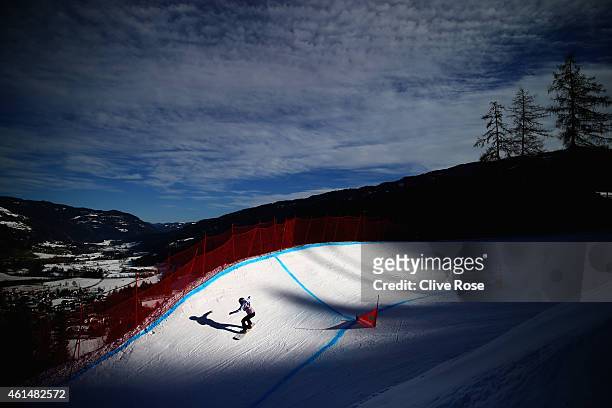 Competitor in action during Women's Snowboard Cross training ahead of the FIS Freestyle Ski World Championships on January 13, 2015 in Kreischberg,...