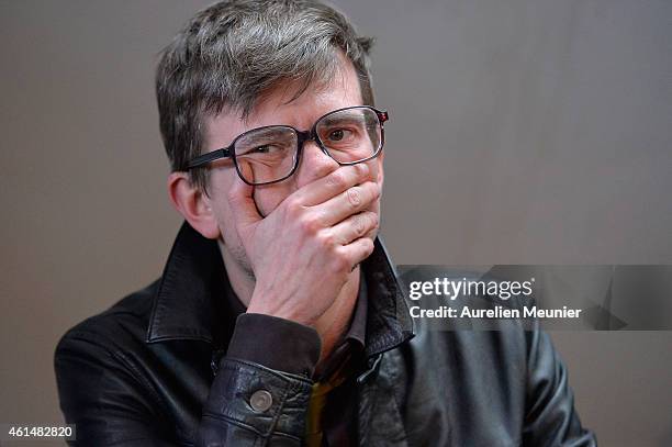 Charlie Hebdo cartoonist, Renald Luzier aka Luz, speaks during the Charlie Hebdo press conference held at the Liberation offices in Paris on January...