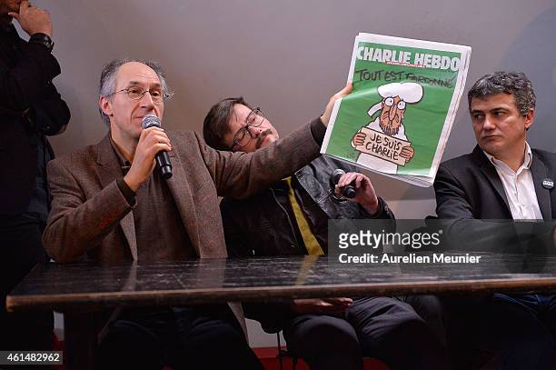 Charlie Hebdo editor in chief, Gerard Briard Charlie Hebdo cartoonist, Renald Luzier aka Luz and Patrick Pelloux , Charlie Hebdo journalist, during...