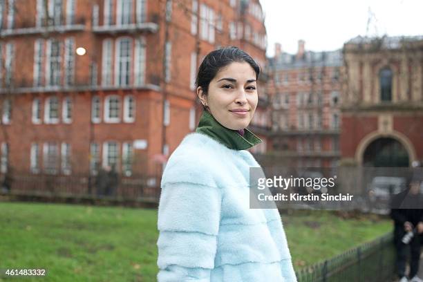 Caroline Issa wearing Lily E Violetta fur jacket, Marc by Marc jacket on day 4 of London Collections: Men on January 12, 2015 in London, England.