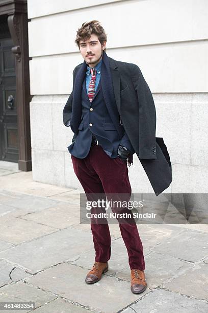 Fashion Student Maximilian Vermilye wearing a Zara jacket, Ralph Lauren trousers and a weekend coat on day 4 of London Collections: Men on January...