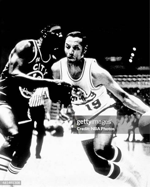 Lenny Wilkens of the Seattle SuperSonics drives against the Golden State Warriors circa 1970 in Seattle, Washington. NOTE TO USER: User expressly...