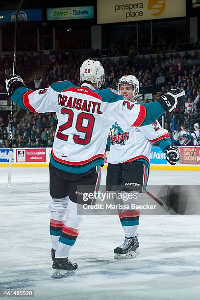 Leon Draisaitl and Josh Morrissey of Kelowna Rockets celebrate a goal against the Medicine Hat Tigers on January 10, 2015 at Prospera Place in...