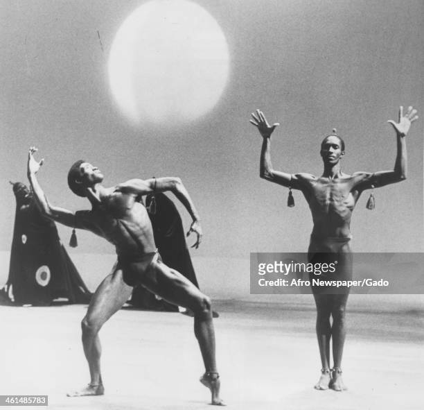Two shirtless African American male dancers perform at the Dance Theatre of Harlem, New York, New York, 1965.