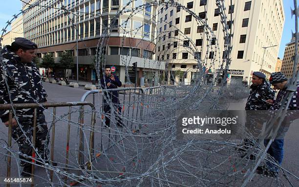Lebanese security forces block the roads with barbed wires as a security measure during the protest of relatives of Lebanese soldiers, kidnapped by...