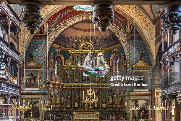 saint jean baptiste cathedral interior - st jean de luz stock pictures, royalty-free photos & images