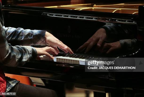 French pianist Helene Grimaud performs during a rehearsal at the new Philharmonie de Paris ahead of its opening in Paris on January 13, 2015. The...