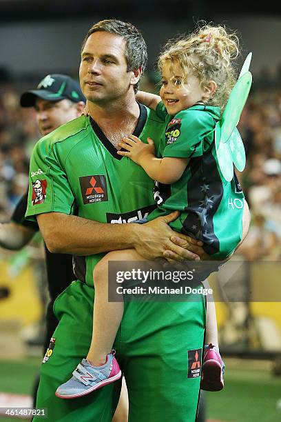 Brad Hodge of the Stars celebrates the win with daughter Sophie Hodge during the Big Bash League match between the Melbourne Stars and the Adelaide...