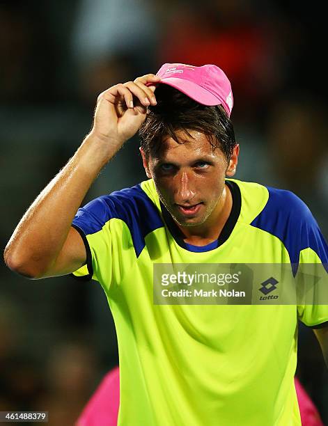 Sergiy Stakhovsky of the Ukraine thanks the crowd after winning his match against Marinko Matosevic of Australia during day five of the 2014 Sydney...