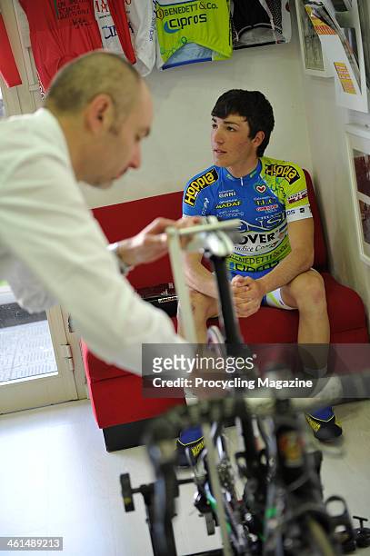 Italian racing cyclist intern Valerio Conti and bike fitter Giuseppe Giannecchini photographed at the Formigli Bikes workshop in Florence, on April...