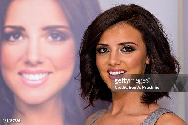 Lucy Mecklenburgh gives an exercise demonstration to launch her new book, 'Be Body Beautiful' at Penguin Books on January 13, 2015 in London, England.