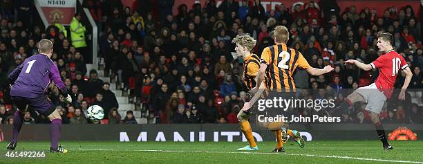 Callum Gribbin of Manchester United U18s celebrates scoring their third goal during the FA Youth Cup Fourth Round match between Manchester United...